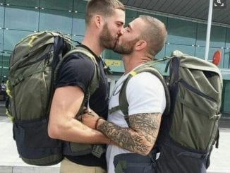 gay men kissing in love