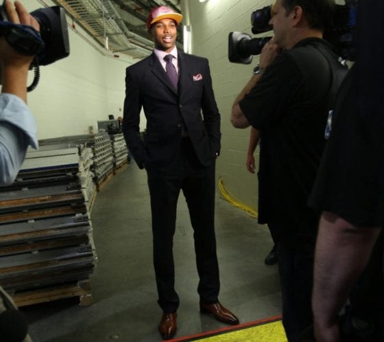 black suit and tan shoes