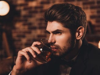 attractive man whiskey