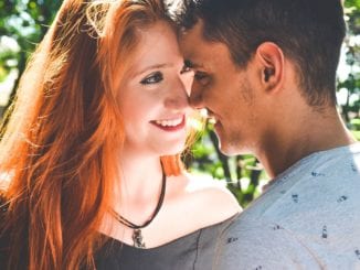 woman attracted to man kissing couple